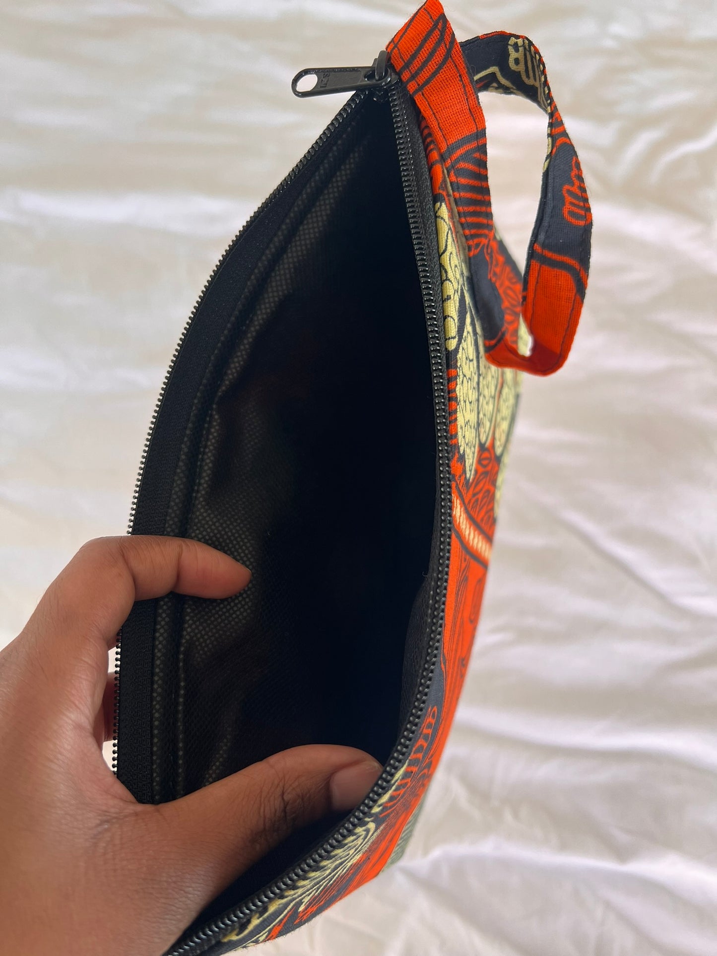 Handmade Ankara Clutch Bag with Hoop – Orange, Black & Cream Print