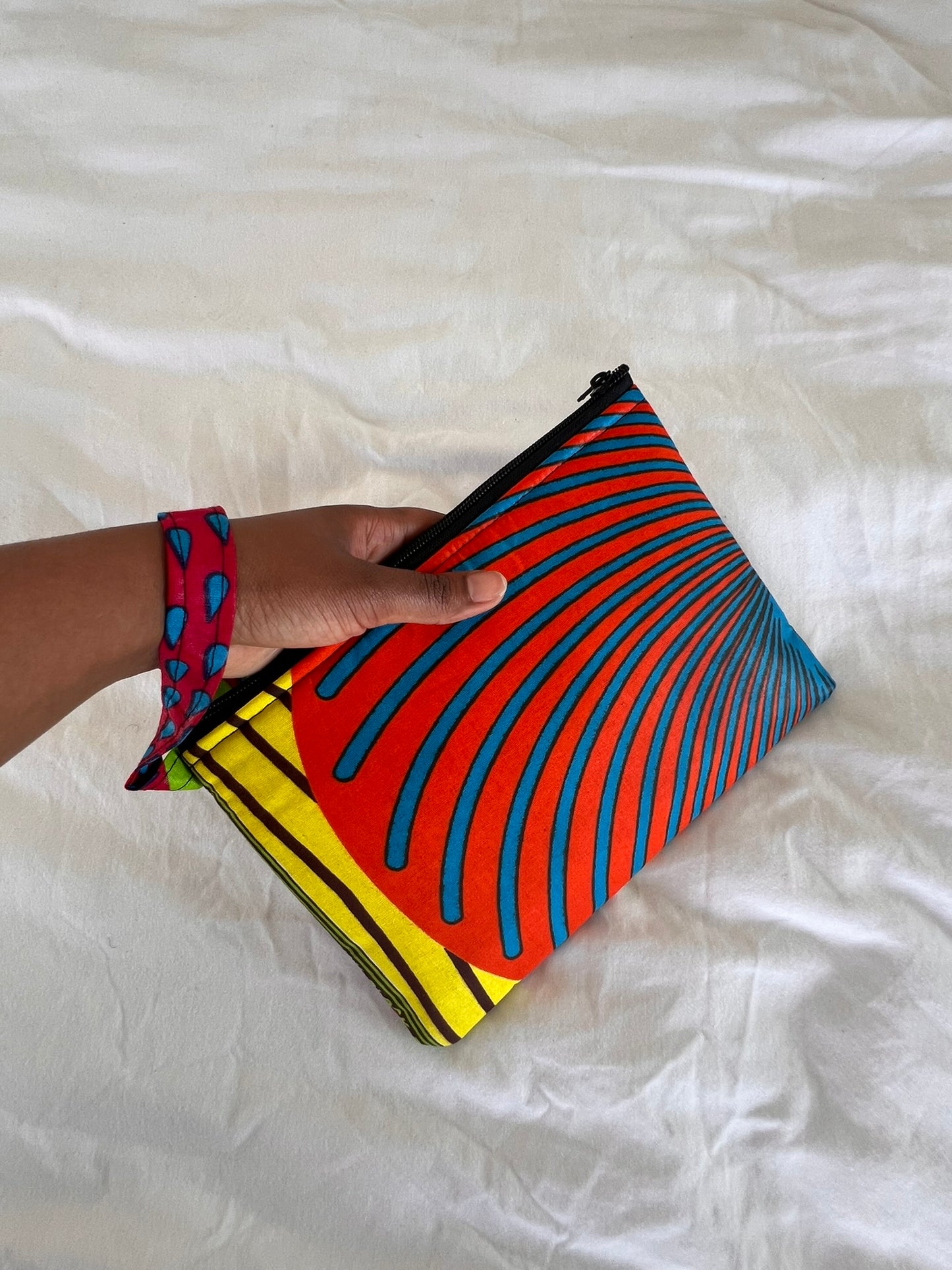 Handmade Ankara Clutch Bag with Hoop – Orange, Blue, Yellow & Pink