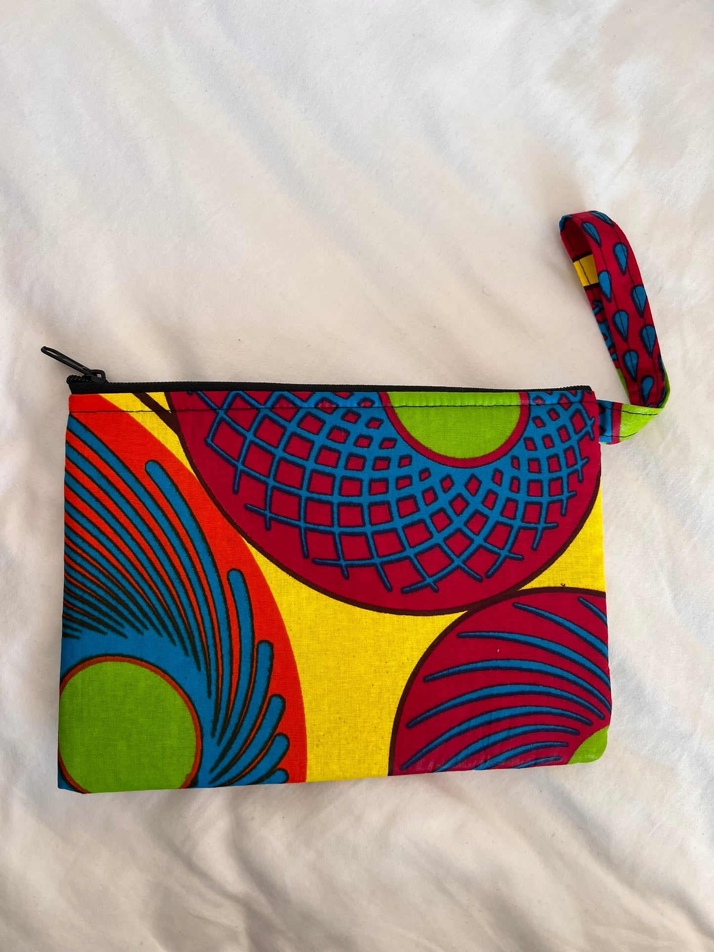 Handmade Ankara Clutch Bag with Hoop – Orange, Blue, Yellow & Pink
